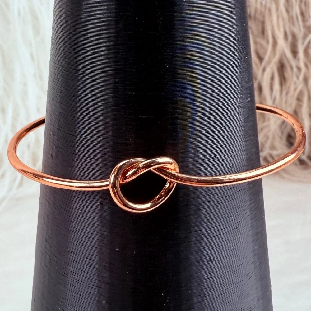 Pretty rose goldtone knotted minimalist cuff bracelet